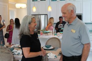 GH Homes Cora Johnston and Realtor Bob Holmquist at Sea View Grand Opening.